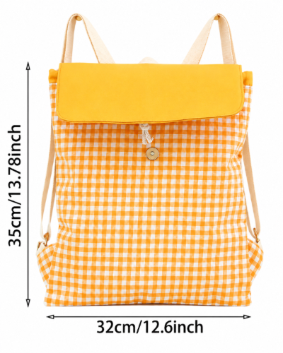Medidas de la mochila amarilla: 35 cm de alto y 32 cm de ancho